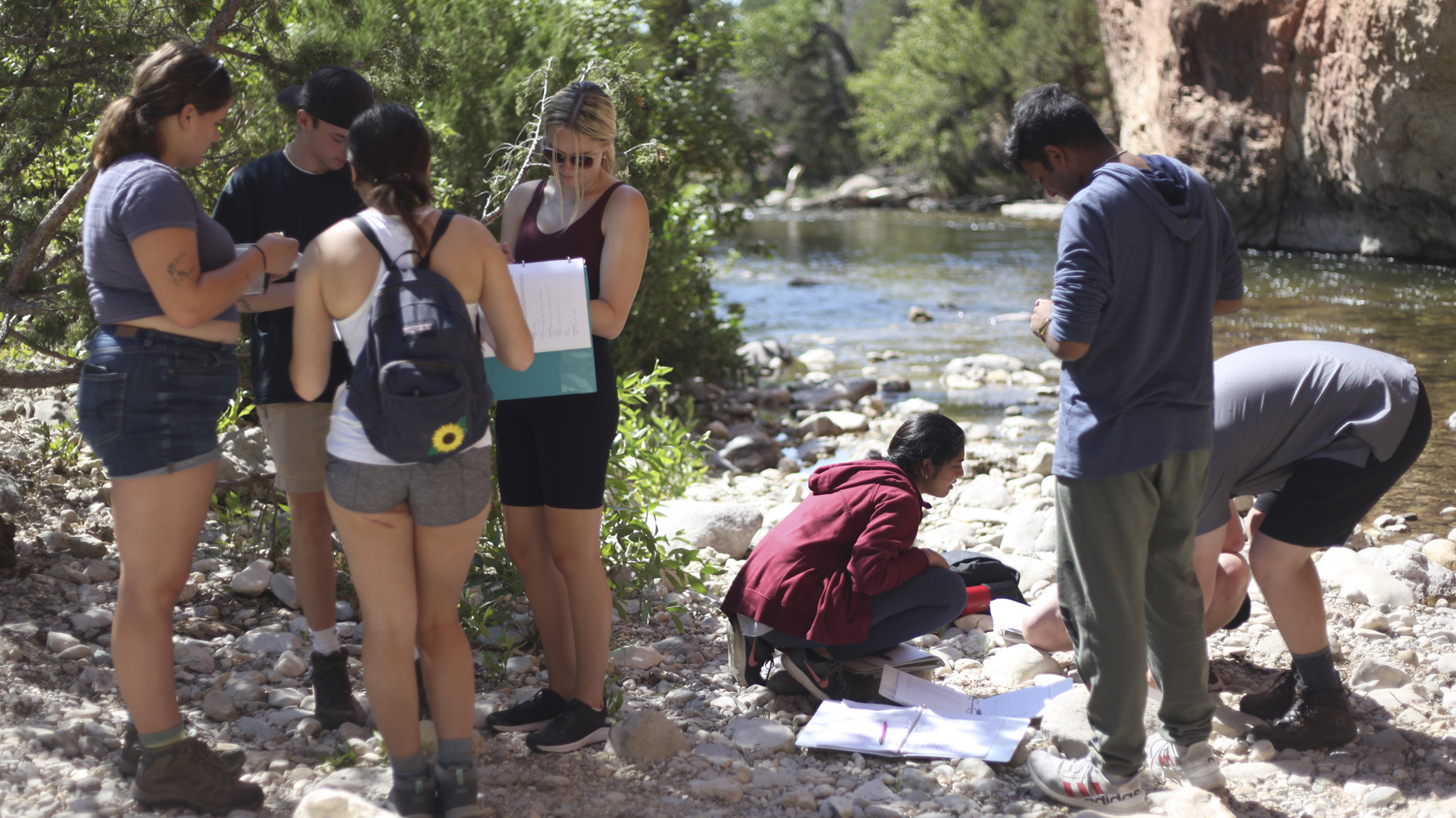 students taking water samples